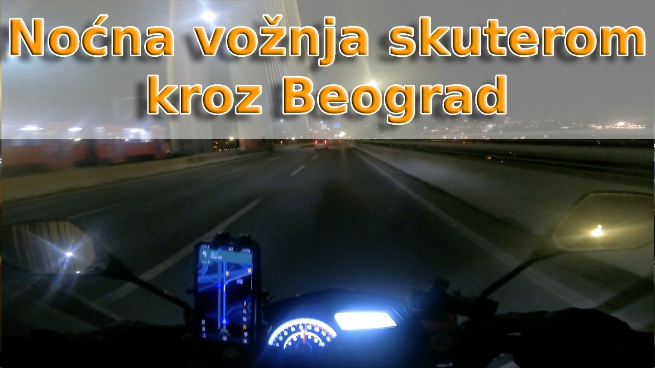 Vožnja skuterom po mraku kroz Beograd