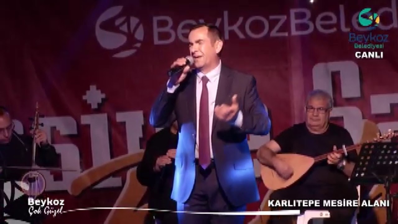 OKAY ÖZTÜRK - KAPININ ÖNUNDE ONLÜK DİKİYİ