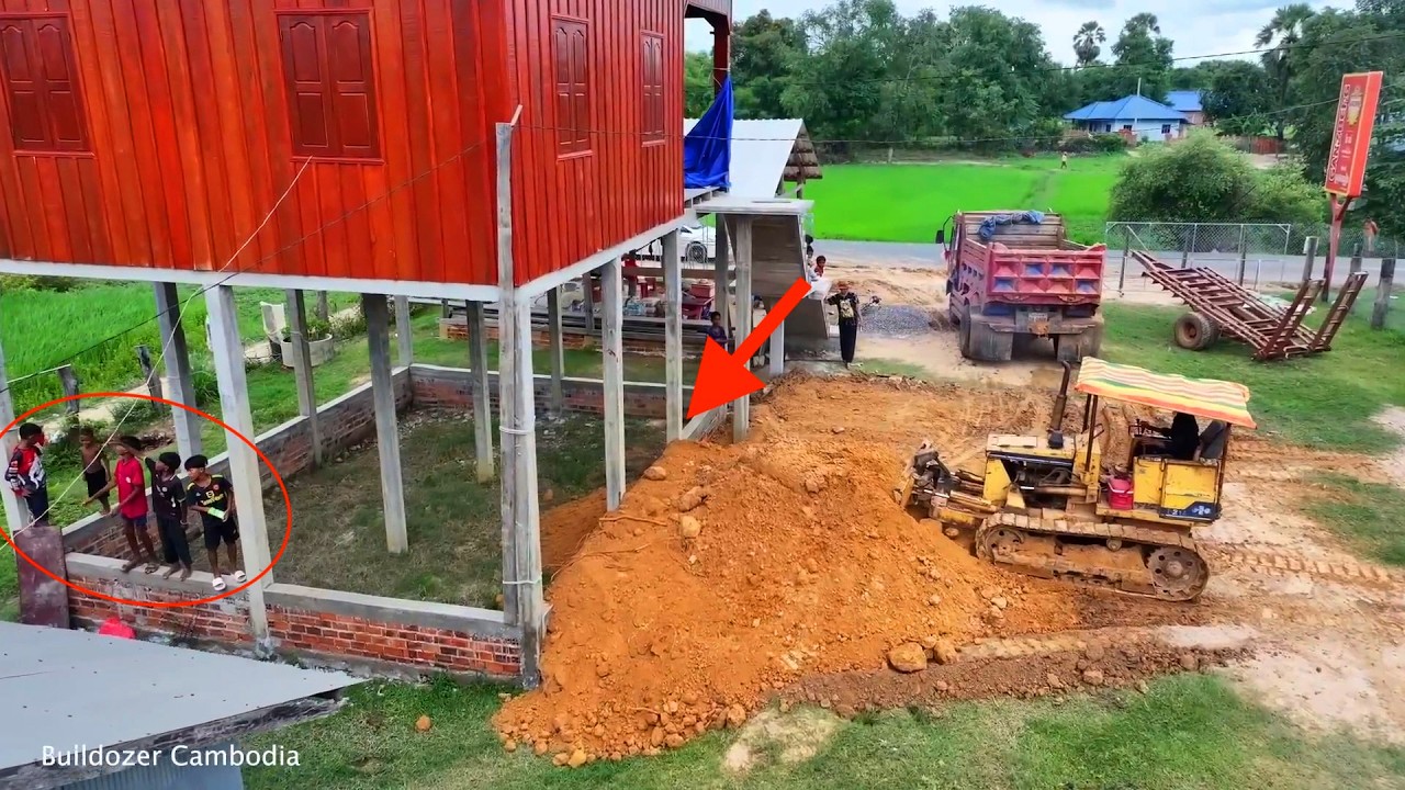 Heavy Bulldozer Pushing Soil for New House Project 