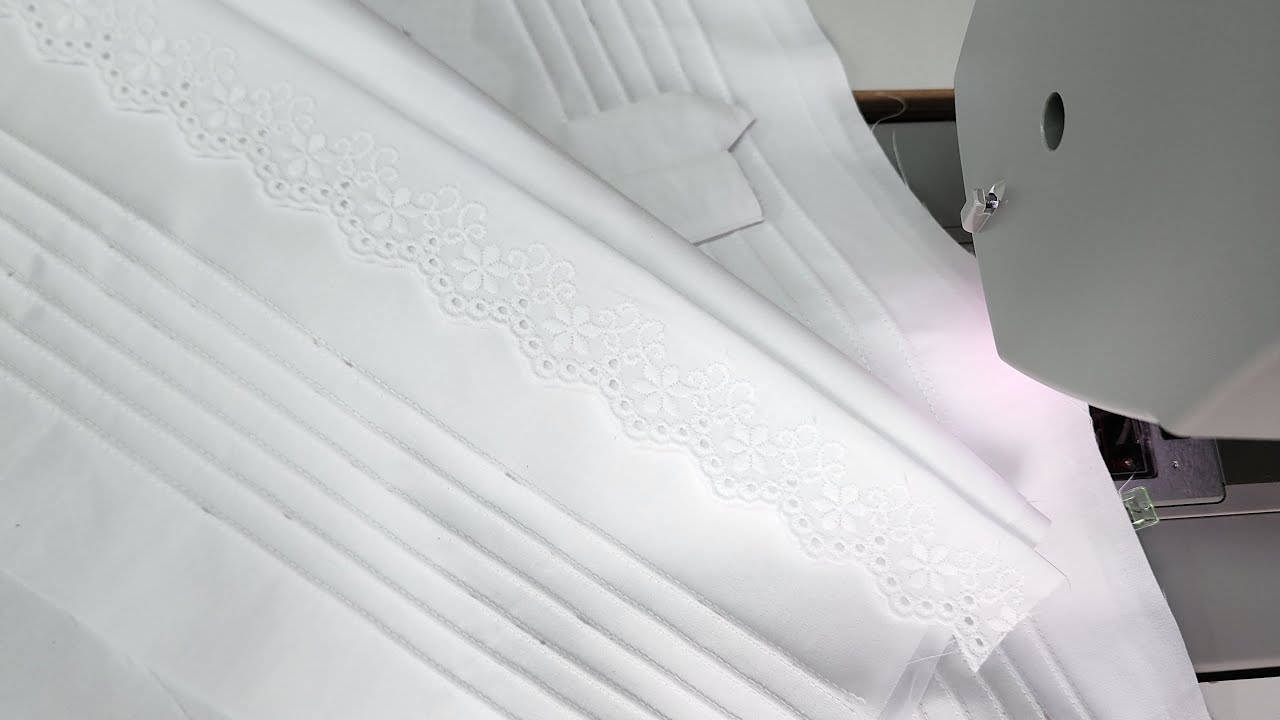 Fronha com nervuras e bordado inglês