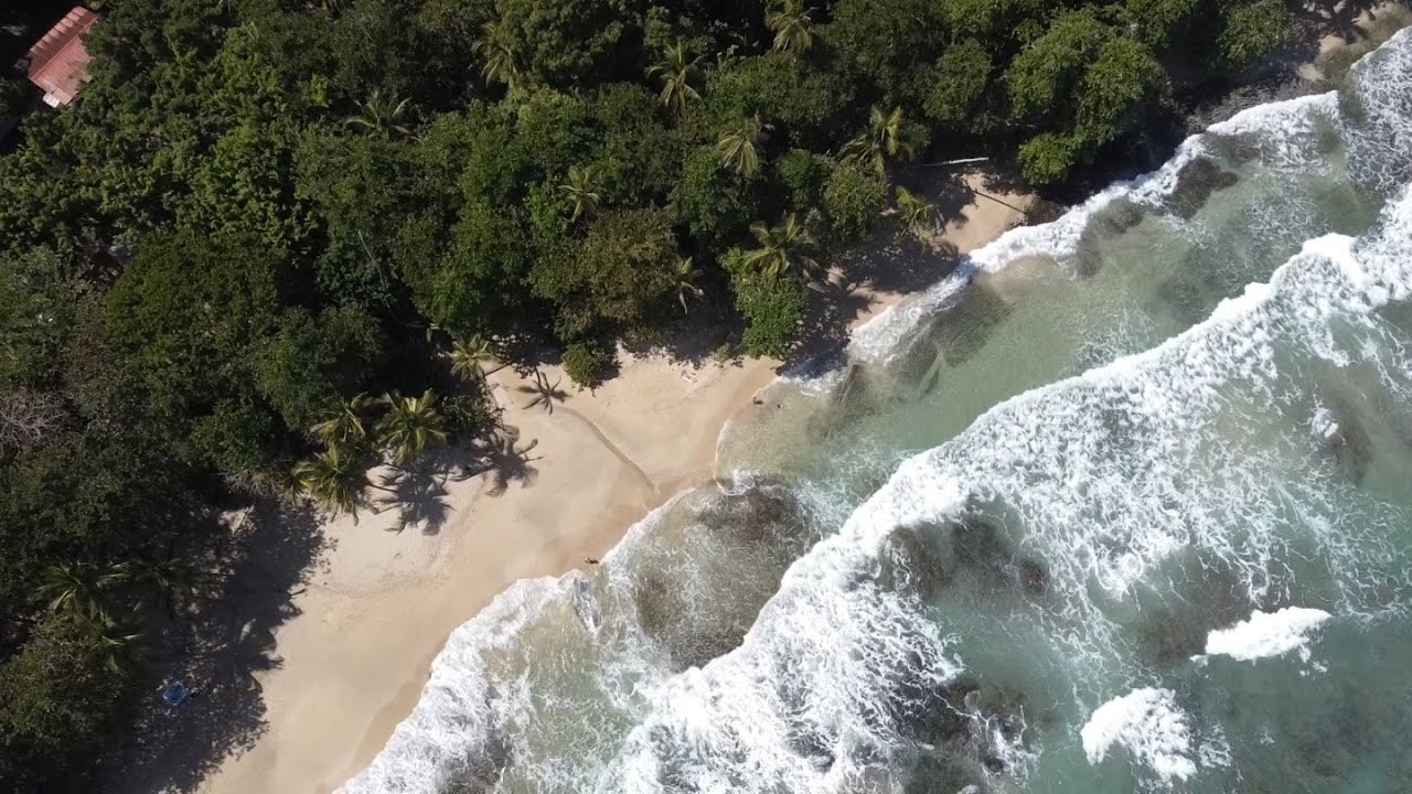 Drone flyover of gorgeous Playa Chiquita, Puerto Viejo, Talamanca, Limon, Costa Rica