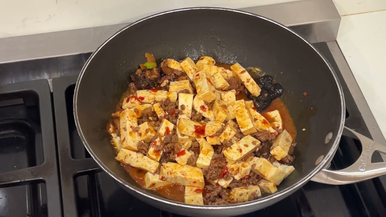 Cooking red hot spicy mapo tofu