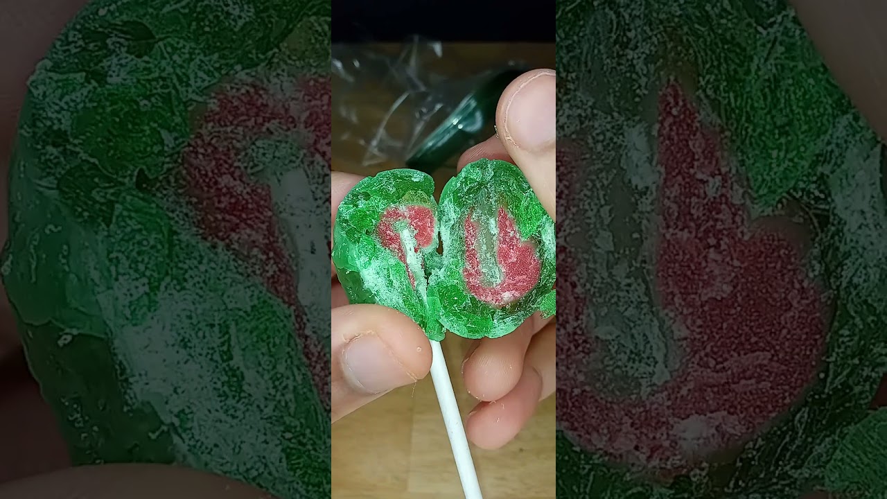 Crackin' open a Sour Apple Super Blow Pop #shorts #candy #videos