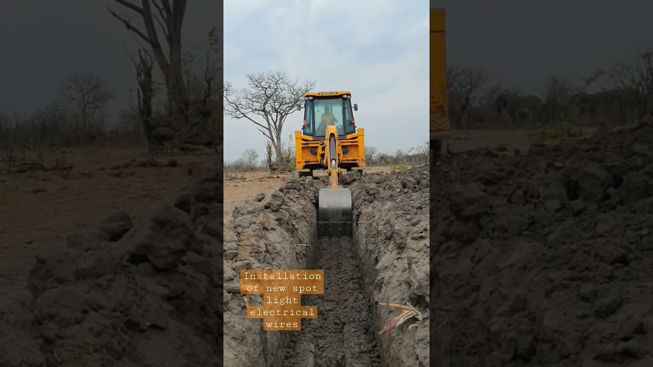 Digging trench to lay electrical wires for a spot light to light up the back of the waterhole.