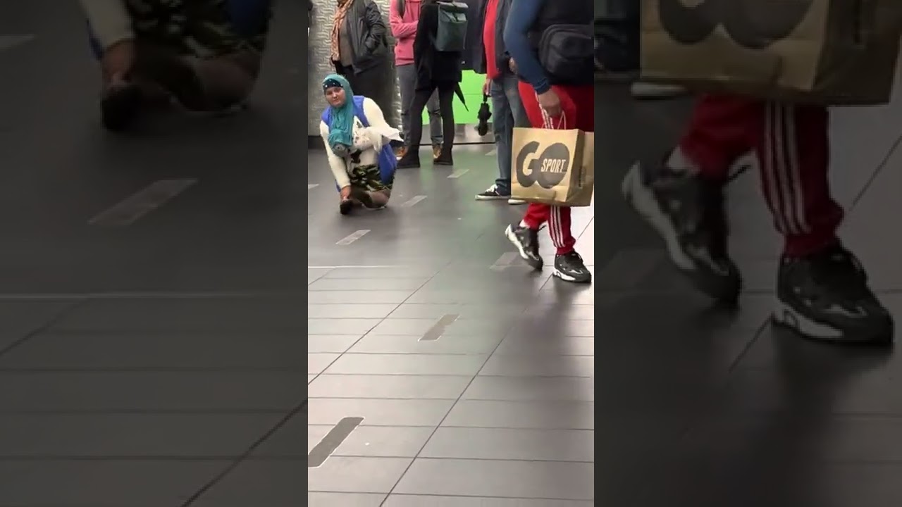 woman with deformed legs begging in the Paris metro, France 2022 🇫🇷🇫🇷🇫🇷🇫🇷🇫🇷🇫🇷🇫🇷🇫🇷