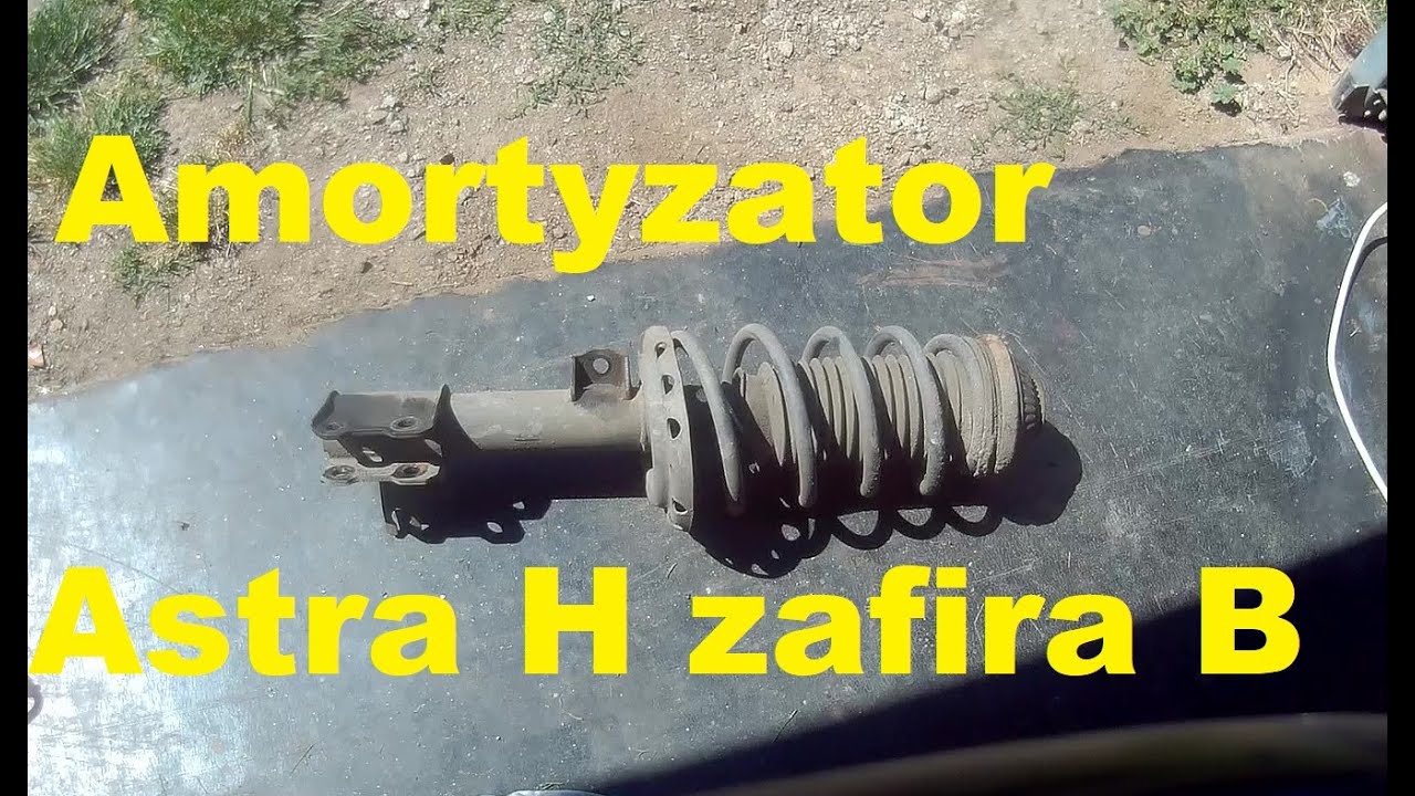jak wymienić amortyzator poduszkę astra h - 3 zafira b. przód