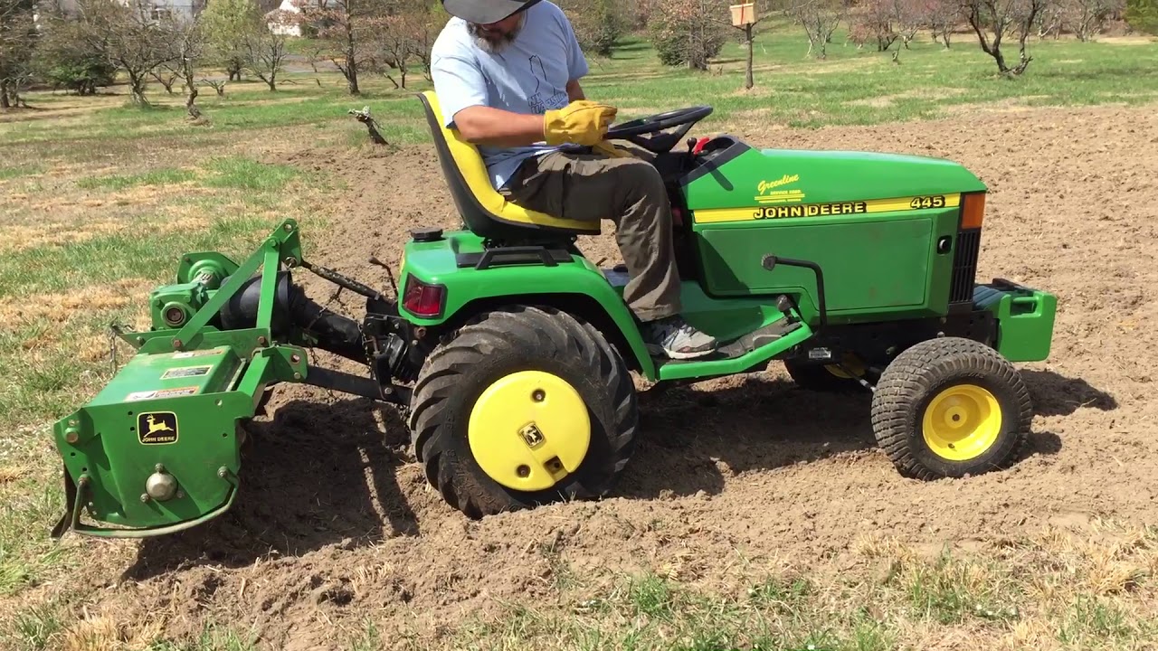 John Deere 445 tilling. 2020