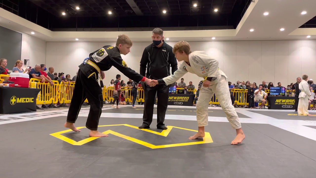 Coach ask kid to let go of BJJ submission and he does