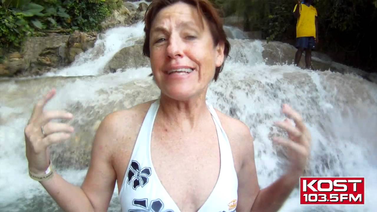Kari Steele Climbs Up A Waterfall At Dunns River in Jamaica
