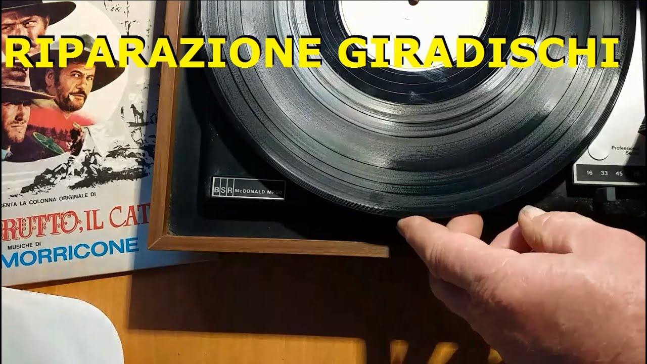 GIRADISCHI riparato e messo in funzione, nel piatto il disco del 