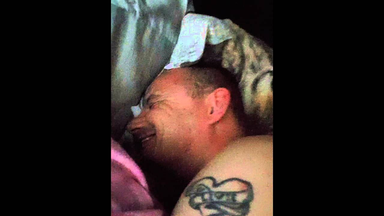 Laughing in his sleep