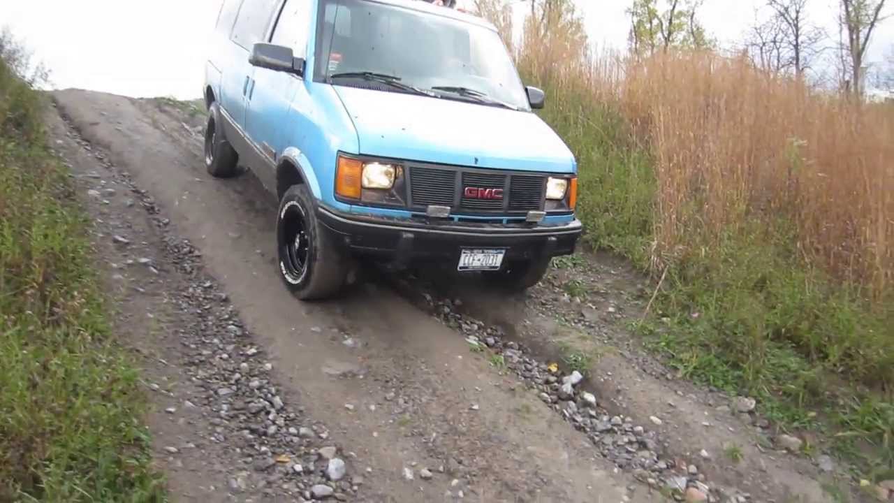 Lifted GMC Safari MUDDING