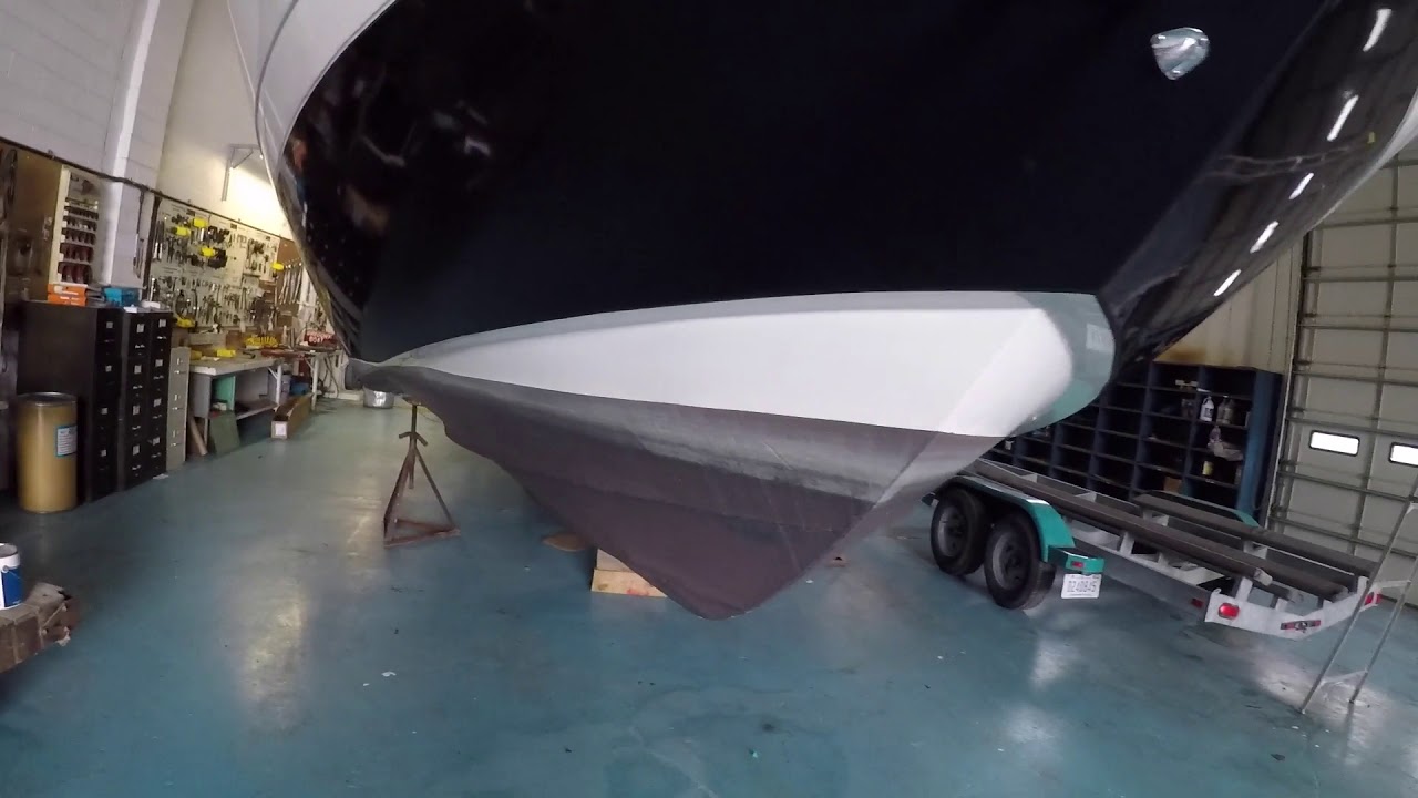 Yacht Boat vinyl wrapped in 3M Gloss Midnight Blue