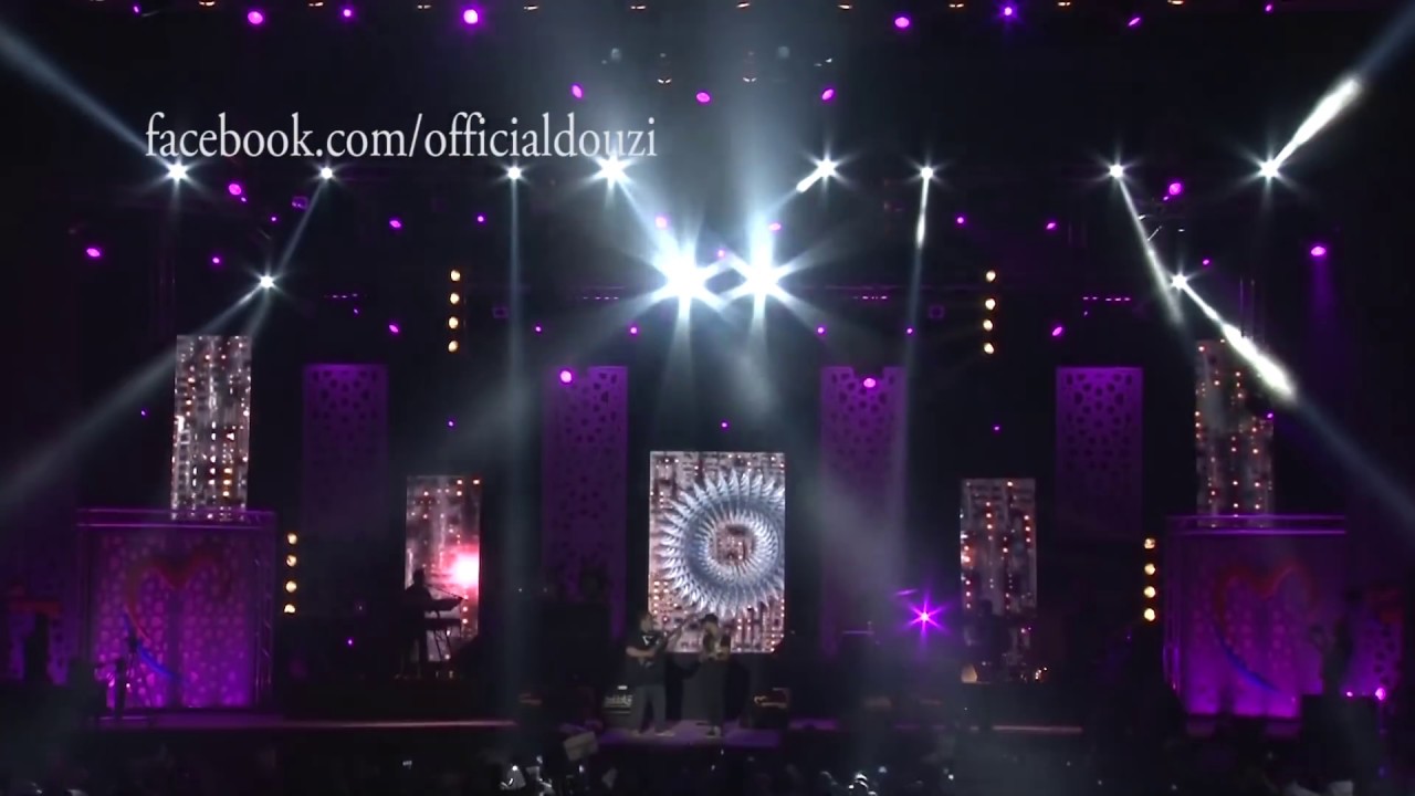 Douzi - Intro + Latgolich Nsani (Festival Mawazine 2014) | (دوزي - لا تڭوليش نساني (مهرجان موازين