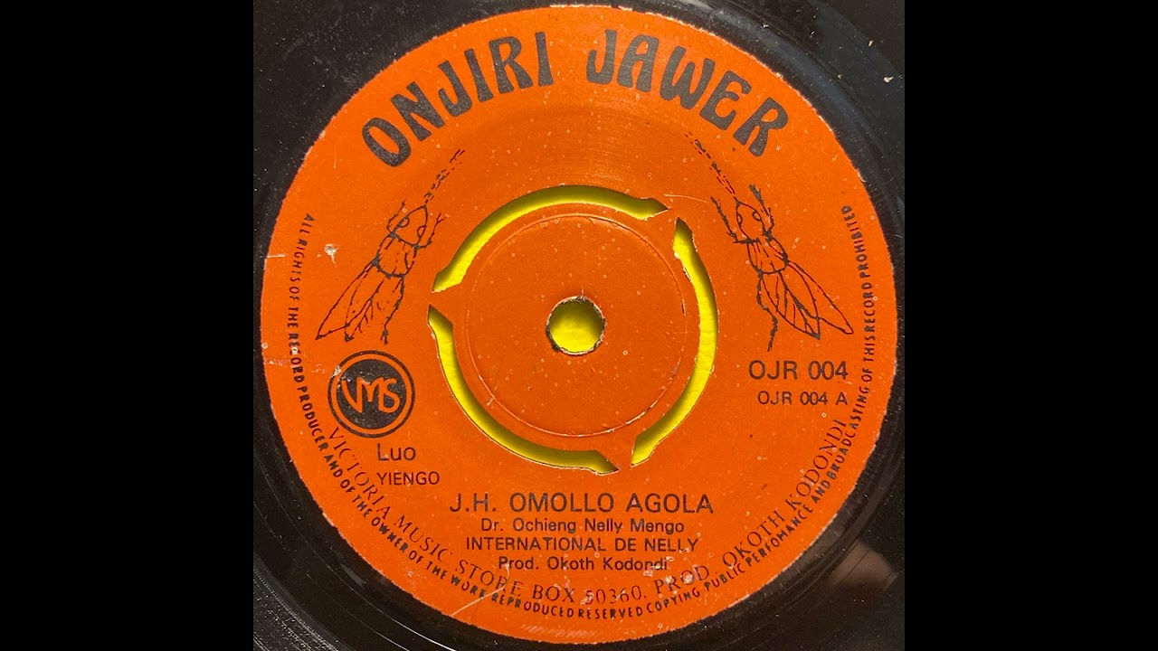 J.H. Omollo Agola - International de Nelly