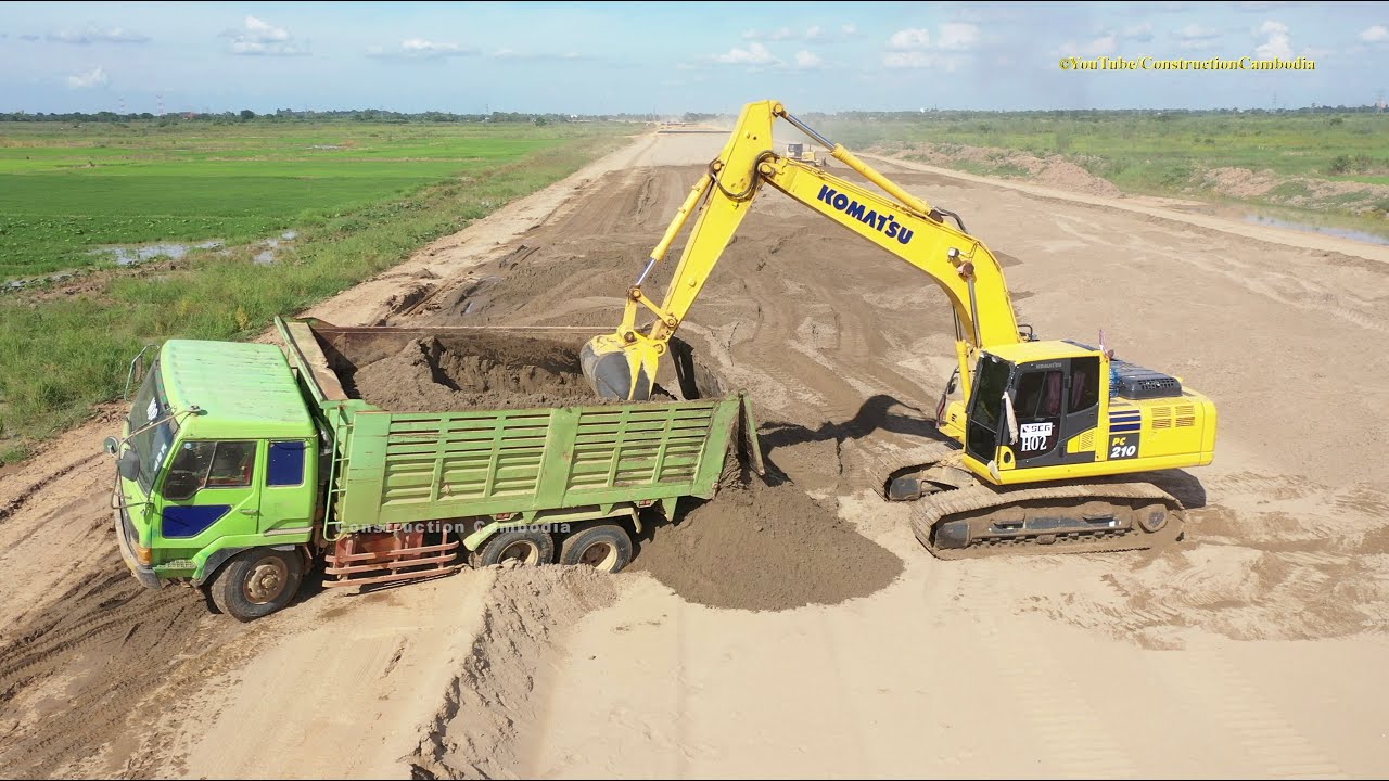 Incredible Dump trucks unloading sand, Excavator and bulldozer pushing sand​ on road construction