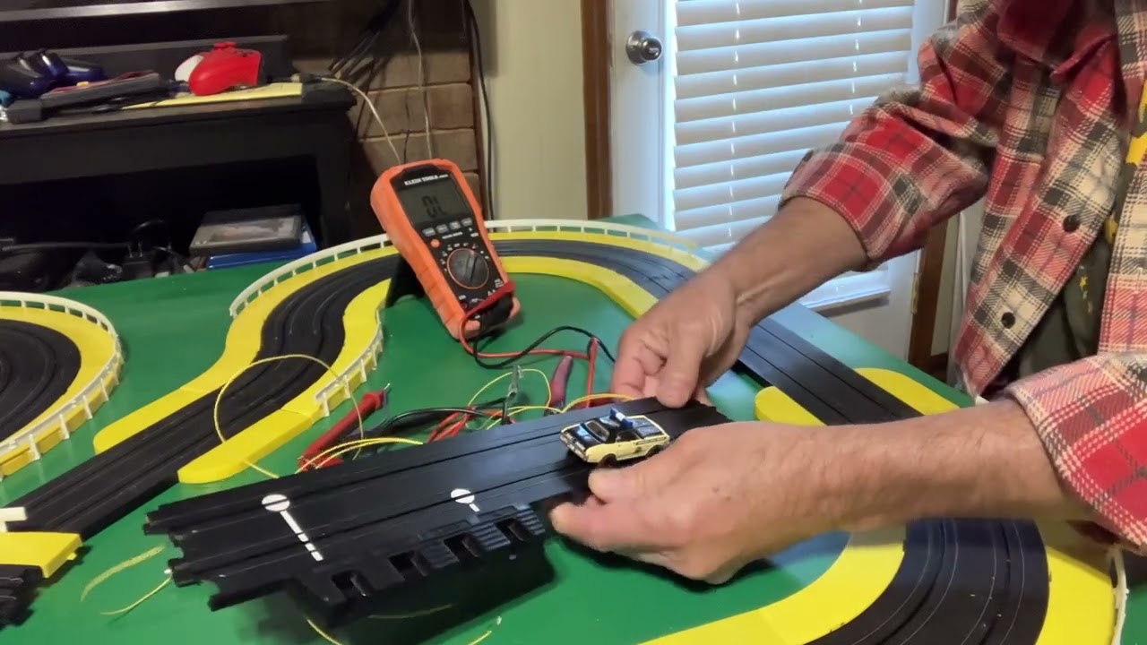 HO slot car track work with reed switches