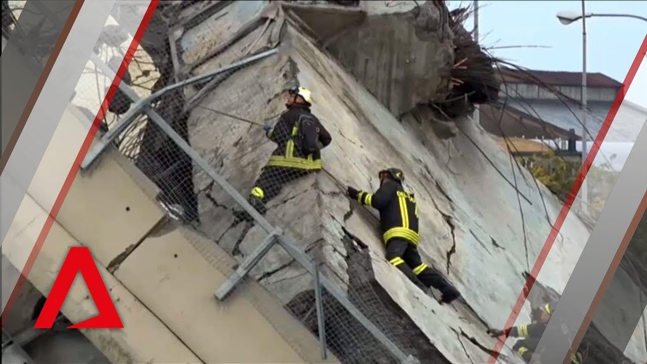 Emergency workers at the scene of collapsed bridge in Italy