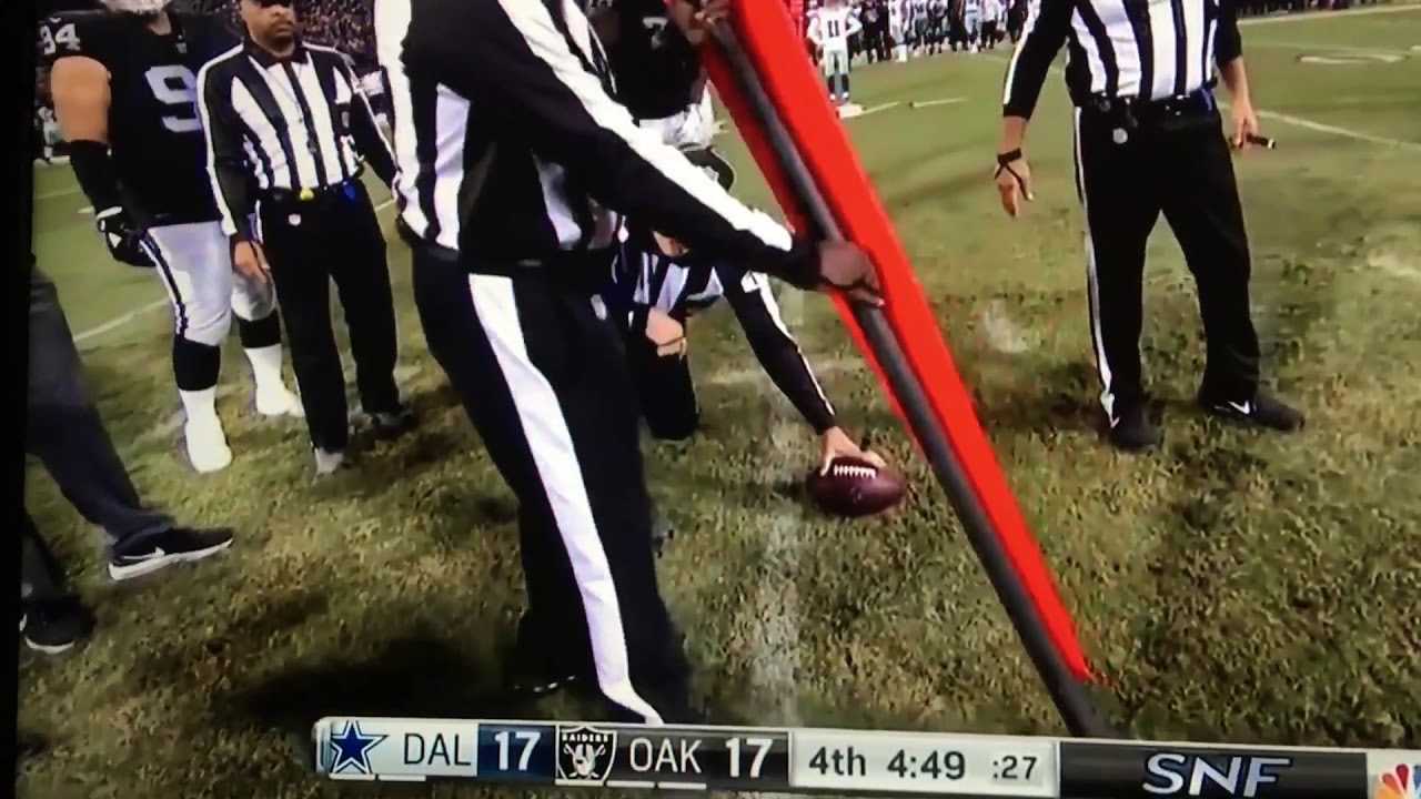 NFL ref uses folded index card to determine first down|Dallas vs Oakland