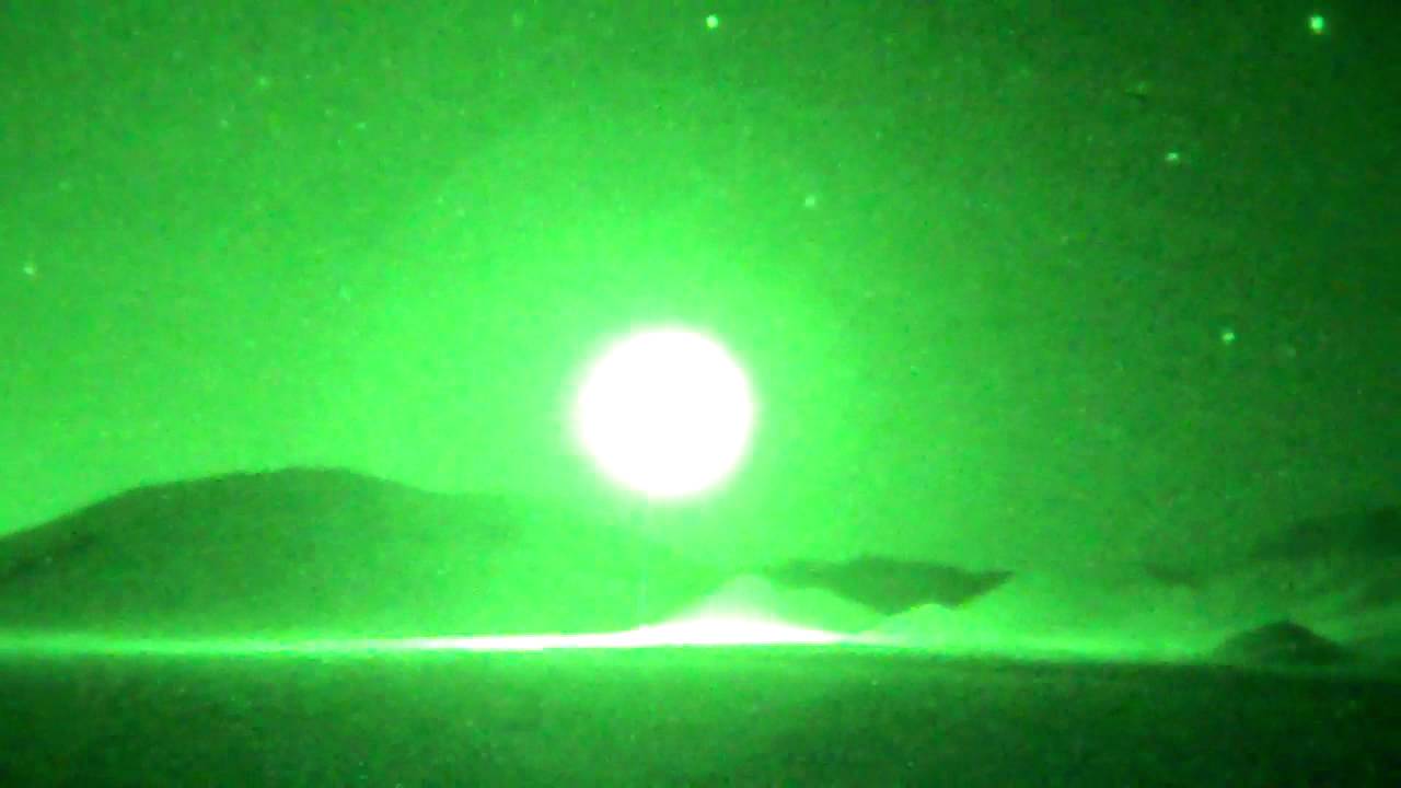 Night vision look at USMC Huey and Cobra helicopter night shoot at Mojave Viper