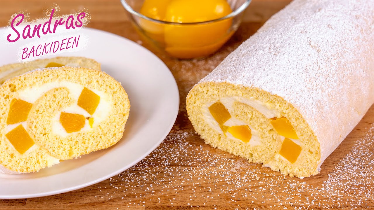 Biskuitrolle mit Pfirsichen - leichtes Rezept | Pfirsichrolle mit Sahne