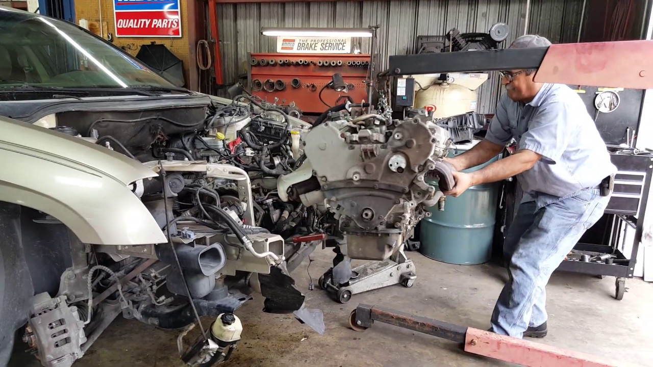 Removing the motor from a Chrysler Pacifica.  Performance Transmission Gainesville, FL