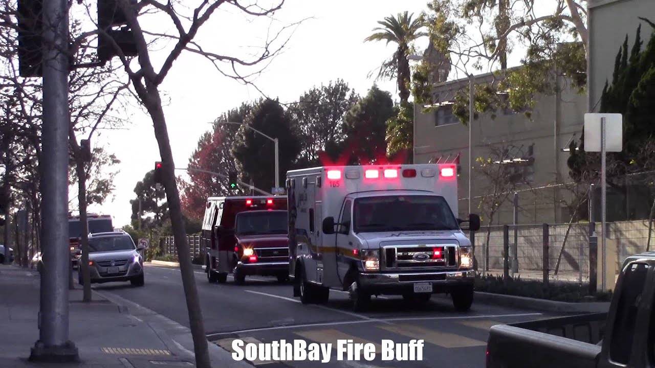 Santa Monica FD RA2 and AmeriCare ambulance transporting