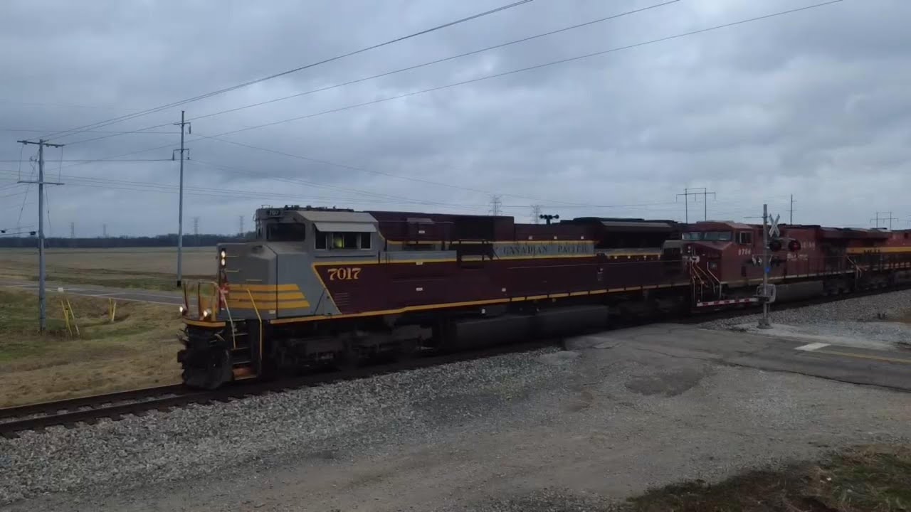 CP 7017 (Maroon & Gray Block) leads NS 363 with a plethora of CPKC units.