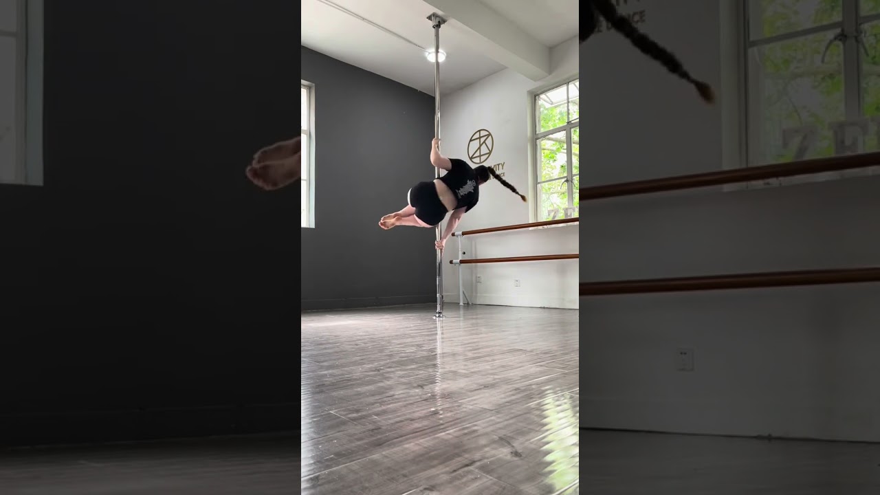 Cradle Spin on Spinning Pole- Pole Mastery Institute