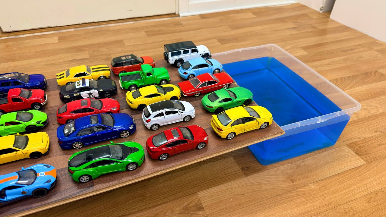 Pullback Toy Cars And Let Go Into The Blue Water
