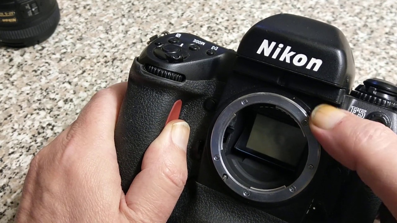 The Beast, Nikon F5, loading with film