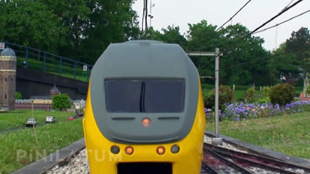 De modelspoorbaan van Madurodam: Een cabinerit door de miniatuurwereld met de trein