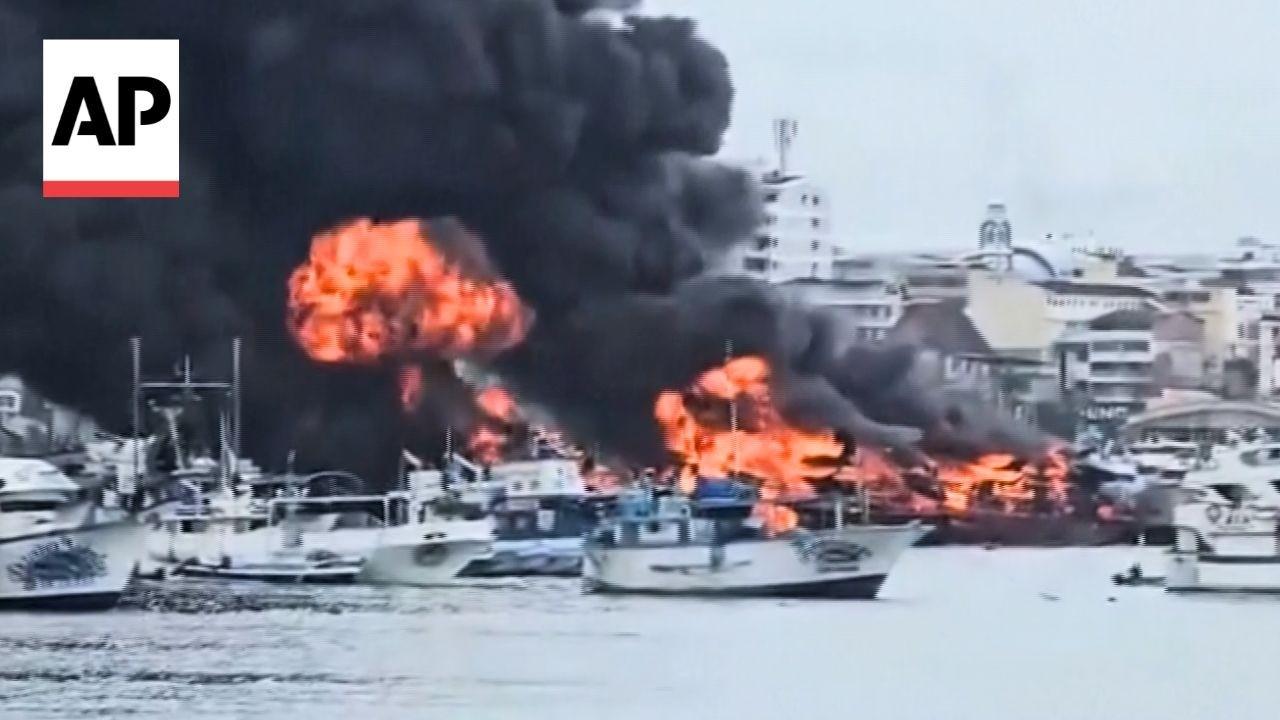 At least 2 injured after fishing boats catch fire in Ecuador