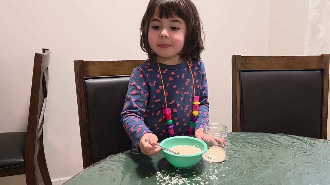 A toddler can make a sensory bin for a baby.