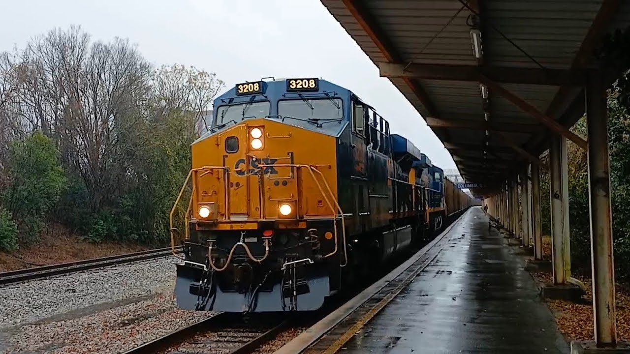 CSXT 3208 leads CSX E368 by Columbia SC Amtrak station on the CSX Columbia Subdivision the S-Line 