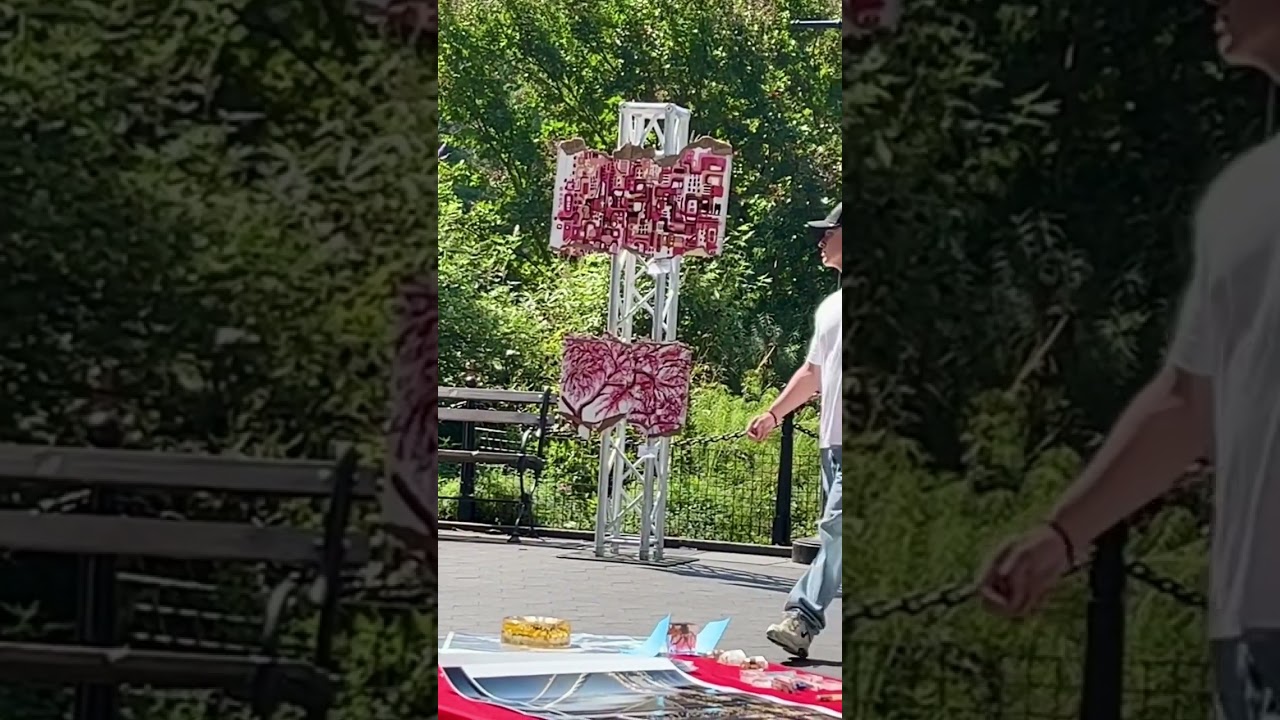 Outdoor exhibition. Washington Square Park. Summer. Art show. NYC.