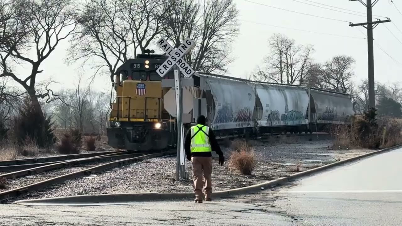 UP815 switching as two KCS freight trains pass (New Format)