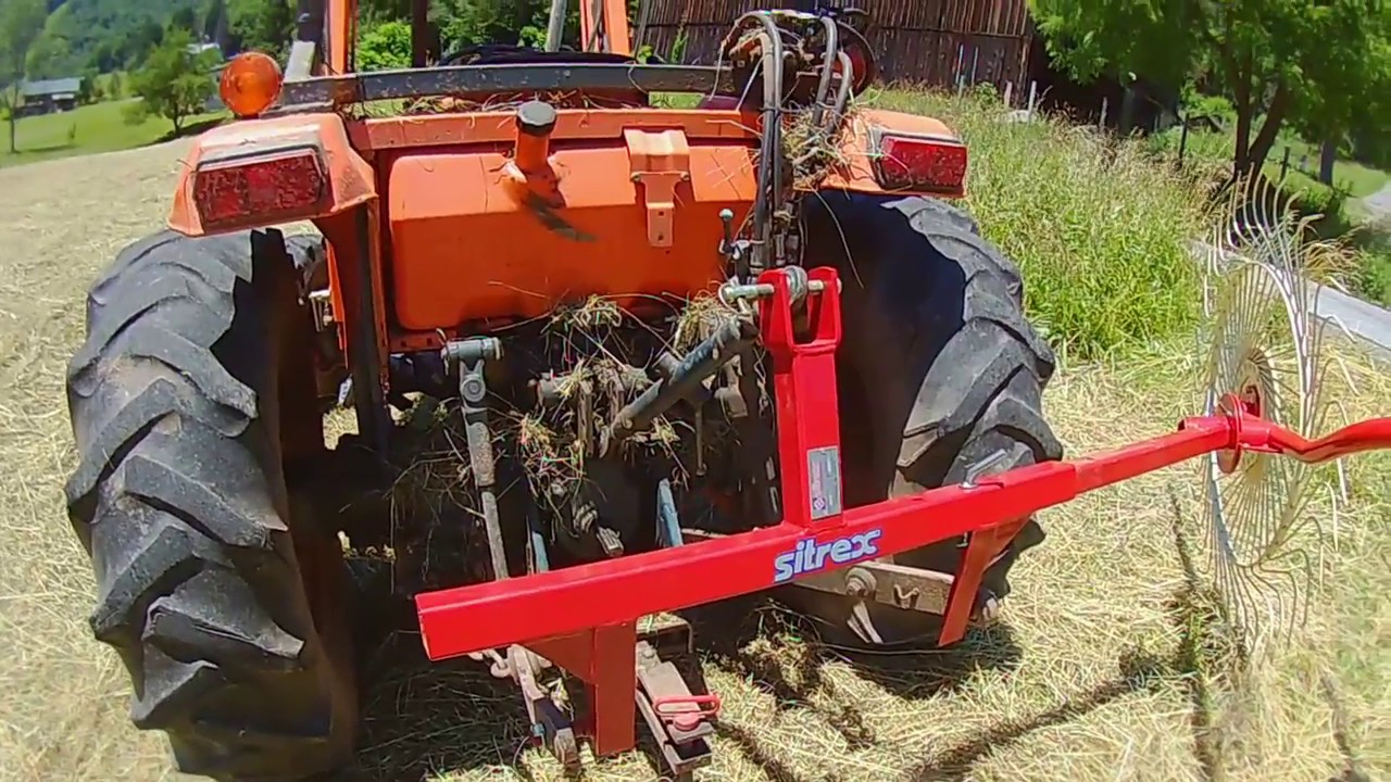 Kubota Raking hay with the sitrex wheel rake