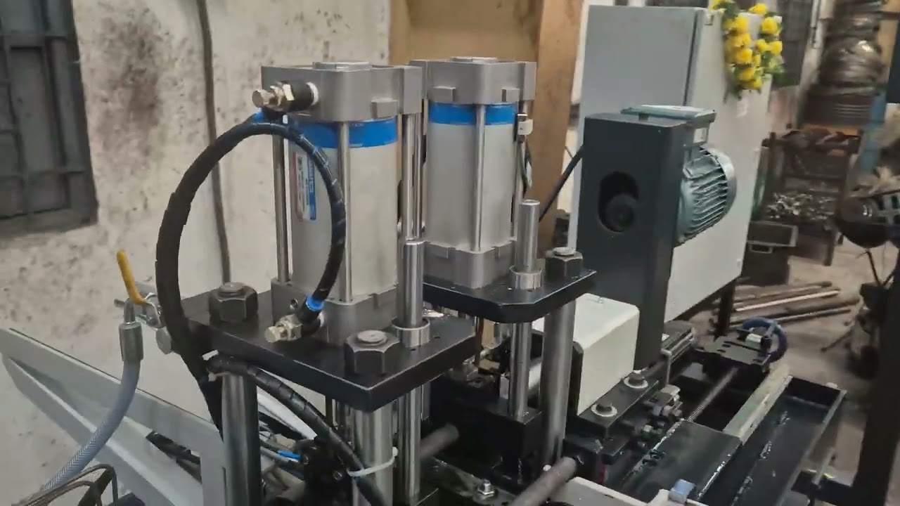 Fully Automatic Shaft Double side Centre hole Drilling Machine.