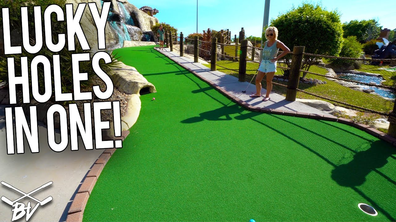 GETTING A LUCKY MINI GOLF HOLE IN ONE AT THIS DINOSAUR THEMED COURSE!