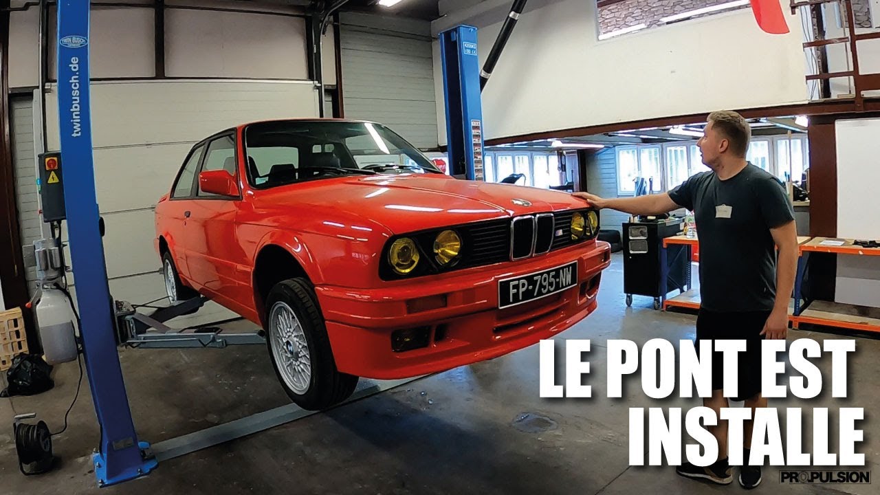 On INSTALLE le PONT ELEVATEUR et les MACHINES A PNEUS au garage