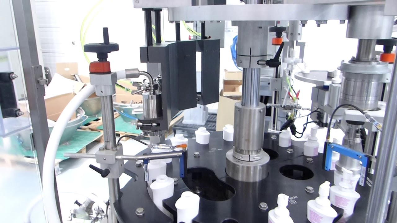 SOREMAT - PKB ROBO  Remplisseuse visseuse automatique de prod.  liquides et semi-pâteux  réf. 4951--