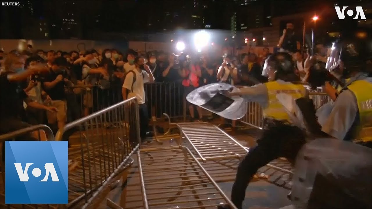 Riot Police Clash With Protesters in Hong Kong
