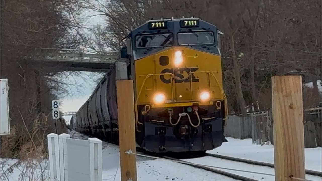 CSX M326 with a mid DPU and a fresh leader going across an old swing bridge!