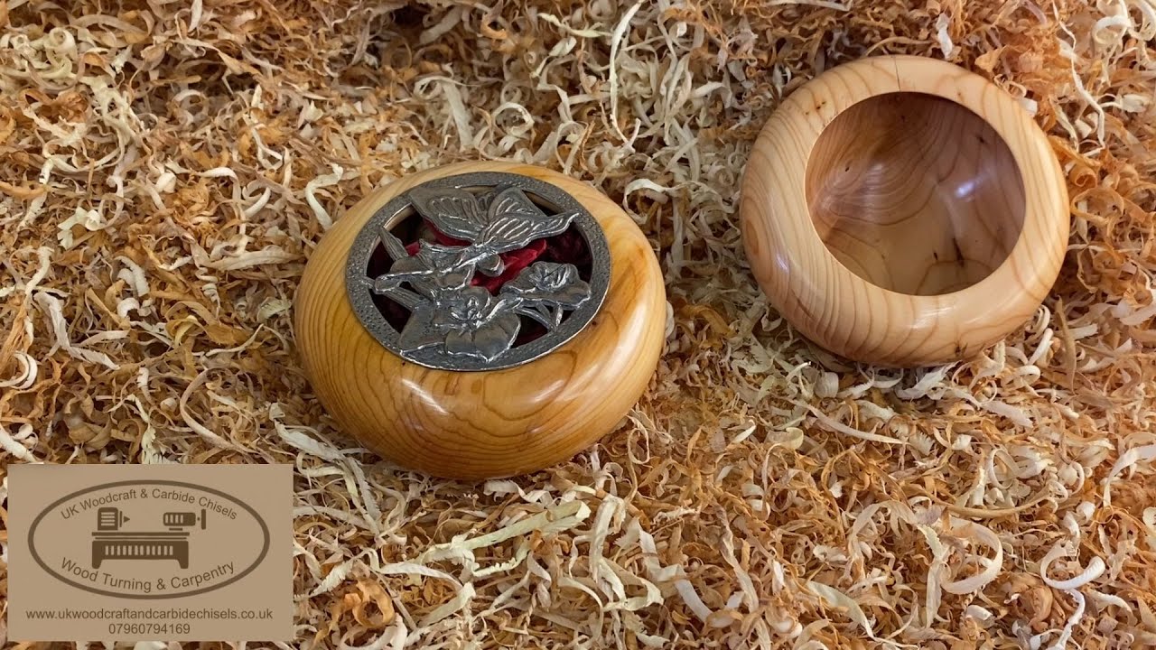 Woodturning turning a little Yew pot pourri pot