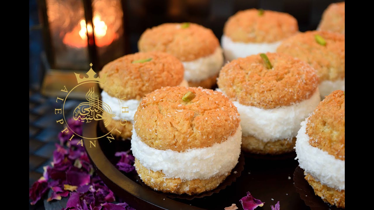 اقراص جوز الهند المحشية كريما ومغلفة بجوز الهند شي غراااااام(ذكريات الطفولة) | NEW COCONUT RECIPE!!