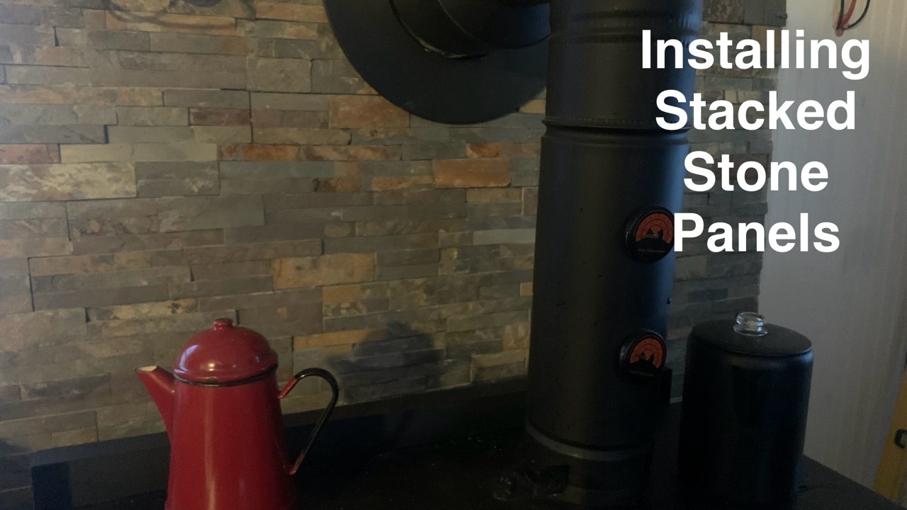 Installing Interlocking Stacked Stone Panels behind the Old Fashioned Wood Cookstove | Tiny Cabin