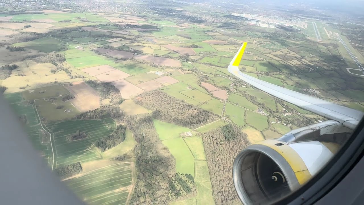 Flying from Manchester to Barcelona with Vueling A321-231!