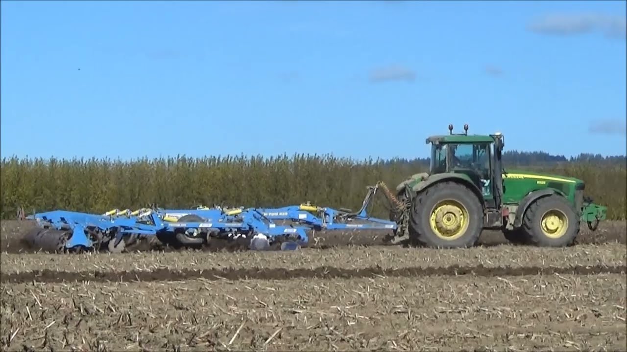 John Deere 8520 a Farmet Triton 450