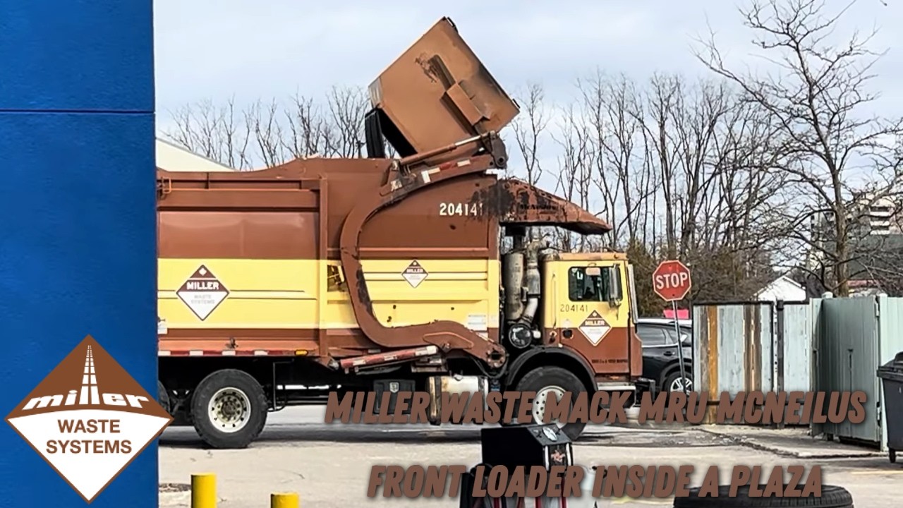 Miller Waste Mack MRU McNeilus Front Loader inside a Plaza